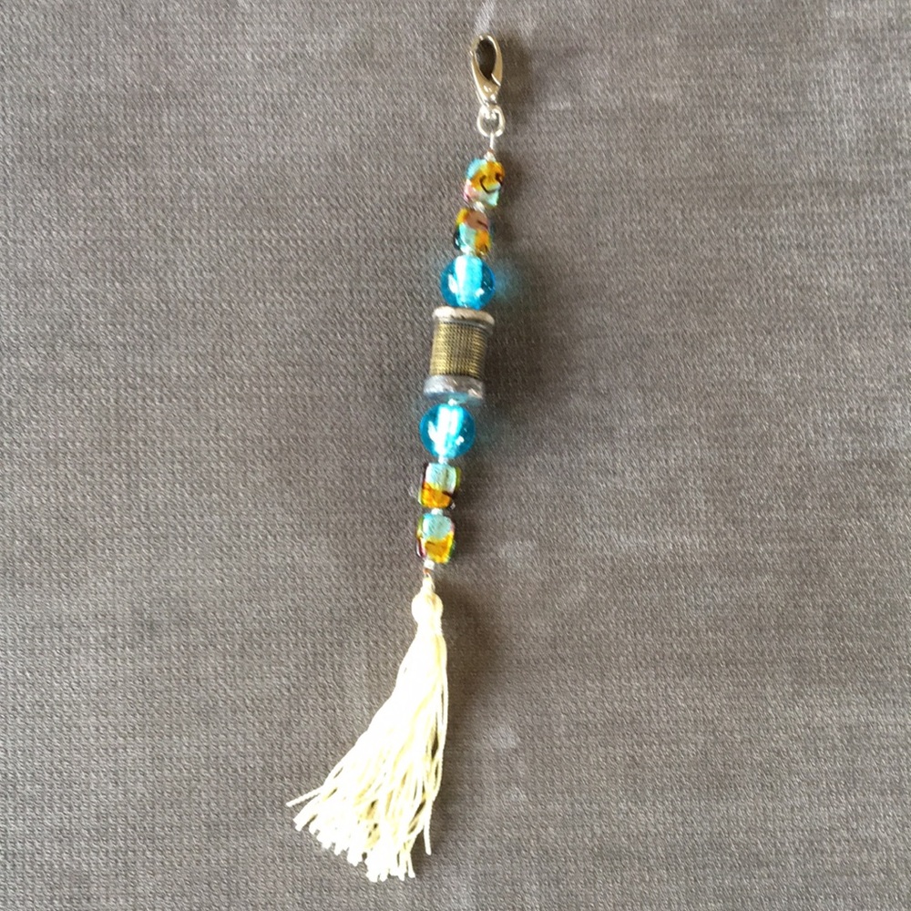 Blue beaded hanging window decoration.